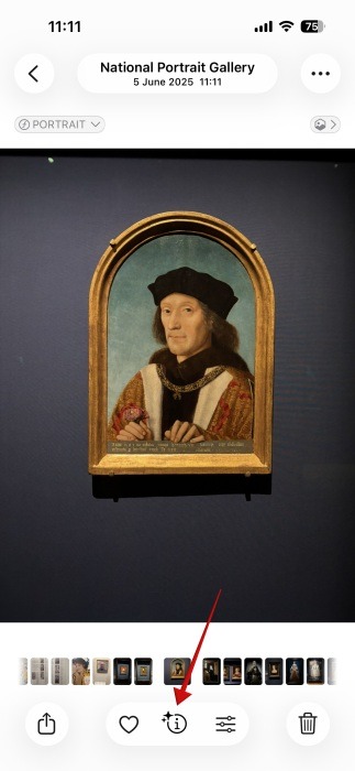 Tapping on "i" button on photo in the Photos app on iPhone. 