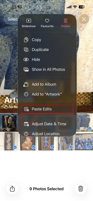 Tapping on "Paste Edits" option for selected photos on iPhone. 