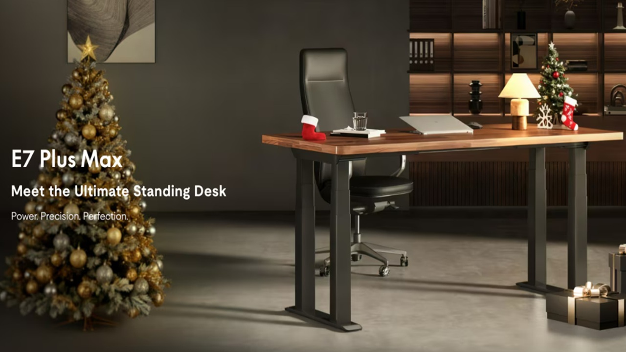 FlexiSpot E7 Plus Max Standing Desk in a Christmas office.