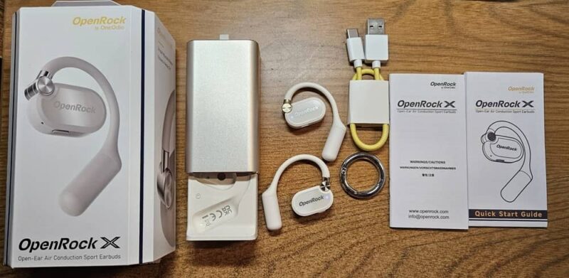 Openrock X Open Ear Earbuds with accessories.