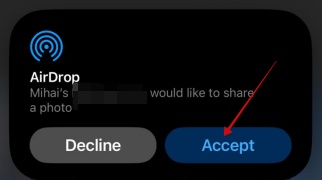 Accepting AirDrop transfer on iPhone. 