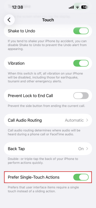 Enabling "Prefer Single-Touch Actions" in iPhone Accessibility settings. 