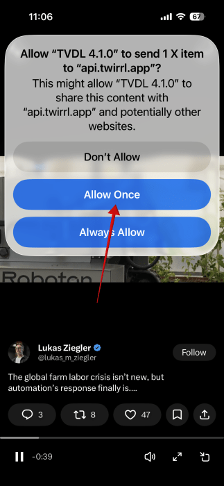 Giving permission for the X video downloading shortcut to run on iPhone. 